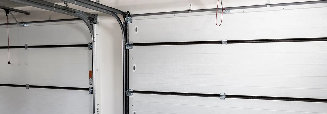 Fix Folding Garage Door Jerking in Hallandale Beach