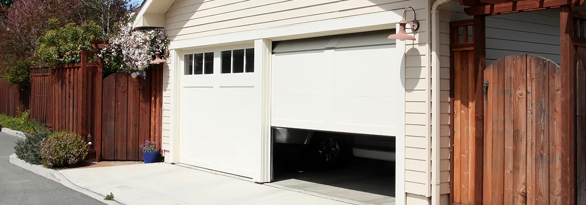 Fix Metal Garage Door Jerking in Hallandale Beach